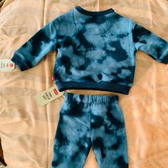 Boys Levi 2-Pc Blue Tie Dye Sweat Suit Fitted Blue Playtime Sets, Blue Cotton Long Sleeve Sets, Indigo Cotton Sets For Spring, Spring Cotton Indigo Sets, Spring Indigo Cotton Sets, Casual Blue Playwear Sets, Blue Fitted Playwear Sets, Fitted Blue Playwear Sets, Blue Cotton Playtime Sets