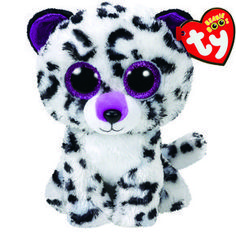 a white and black stuffed animal with big eyes