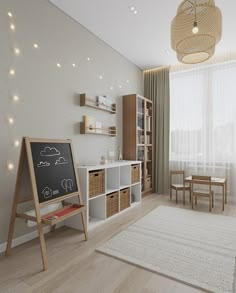 an empty room with a chalkboard in the corner and wooden furniture on the floor