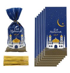 five bags of gold incense sticks with the image of a mosque in the background and six packs of them