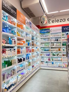 a pharmacy store filled with lots of different types of medicine bottles and containers on the shelves