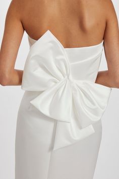 Duchess satin slim dress with back bow detail. Wedding Dresses Back Bow, Luxury Satin Dress With Bow Tie Back, White Formal Dress With Satin Bow, White Elegant Dress With Satin Bow, Sleeveless Wedding Dress With Satin Bow, Luxury A-line Dress With Satin Bow, Amsale Dress, Short Bridal Dress, Wedding Dress Backs