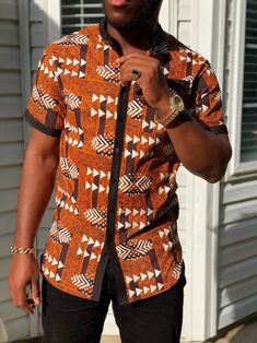 This is a unique and beautiful shirt perfect for either casual or formal occasions. FABRIC DETAILS/ OVERVIEW Short sleeve shirt Soft and comfortable African Cotton. Ankara fabric/ African wax Designed in the U.S.A and made in Nigeria CARE INSTRUCTIONS: Hand wash in cold water, DO NOT BLEACH, Hang dry, Press with cool iron on the wrong side only. African Print Shirts For Men, African Shirts Designs, Ankara Shirts For Men, African Men Clothing, Male Shirt, Grooms Men, African Print Shirt, African Shirts For Men, African Clothing For Men