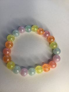 Rainbow pearl braclet *NEW* Rainbow Pearl, Rainbow Pastel, Kawaii Jewelry, Pastel Rainbow, Portland, Jewelry Bracelets, Beaded Bracelets, Pastel, Rainbow