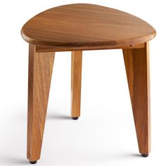 a small wooden stool with black legs on an isolated white background for use as a side table