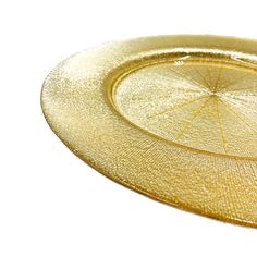 an empty gold plate on a white background