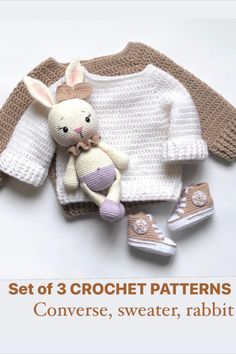 a crocheted sweater and booties with a bunny on it