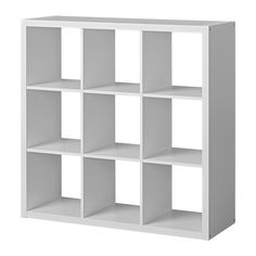 a white bookcase with six shelves on each side