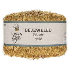 yarn ball in gold with the label bejeweled sequin gold