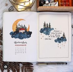 an open notebook with watercolors and writing on it