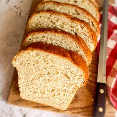 slices of bread sitting on top of a cutting board