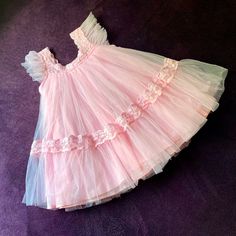 New Pretty Baby Girl Powder Pink Poofy Short Sleeve Tulle Dress With Crochet Detailing. Back Zipper. Never Worn, Excellent Condition No Rips Or Stains. Perfect For A Cute Birthday Party Or Flower Girl Dress! Pink Short Sleeve Tutu Dress With Ruffles, Sweet Ruffled Tutu Dress, Pink Princess Dress With Lace Trim For Dress-up, Cute Spring Princess Dress For Play, Summer Princess Dress With Ruffles For Playtime, Cute Tulle Dress For Playtime, Pink Tutu Dress With Lace Trim For Dress-up, Pink Lace Trim Tutu Dress For Dress-up, Summer Ruffled Tutu Dress For Play