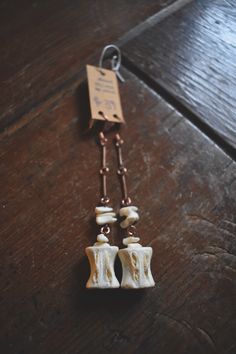 Another pair of bonkers alligator bone earrings, with coyote wrist bones, too. Find pieces like this and more at http://www.deadthingsbysarah.com! Bone Earrings, Alligator