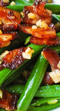 green beans, bacon and pine nuts are piled on top of each other