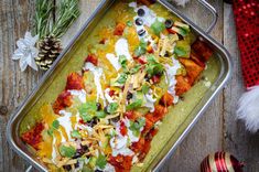 a casserole dish filled with mexican food