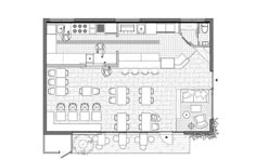 the floor plan for an office with two desks and one kitchen area, as well as