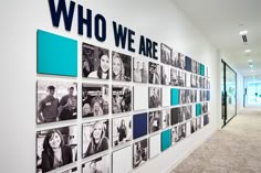 there is a wall with pictures on it that says who we are and people in the background