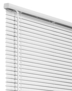 a close up view of a white window blind