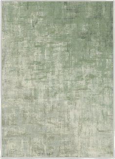 an area rug with green and white colors