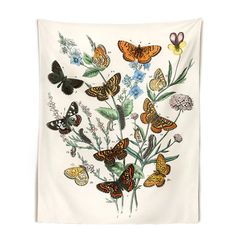 a white wall hanging with butterflies and flowers on it, in front of a white background