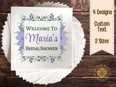 paper napkins with the words welcome to marina's bridal shower on them