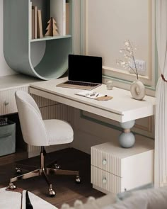 a white desk with a laptop on top of it next to a chair and bookshelf