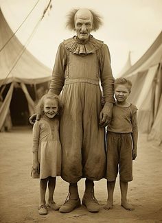 an old photo of three children standing in front of a clown