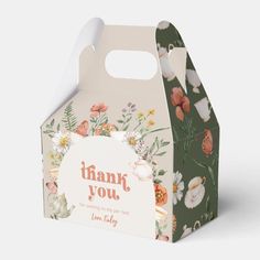 a thank you gift box with flowers and birds on the front, printed with words