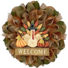 a welcome wreath with a turkey on it