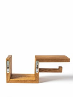 two wooden shelves with metal handles against a white background