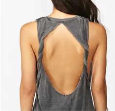 the back of a woman's grey top