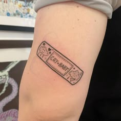 a person with a small tattoo on their arm