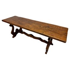 an old wooden bench is shown against a white background for use as a table or bench