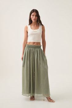 PRODUCT DETAILS Women’s midi skirt Voluminous silhouette Removable self tie belt Raw finish waistband Side pocket Zip, hook and eye closure Lined style Shop All Skirts SIZE AND FIT Model wears a size 8/S Model: 173cm/ 5'8 Bust: 84cm Waist: 64cm Hips: 86cm FABRICATION 50% Tencel, 38% Linen, 12% Nylon Knit Jumpsuit, Denim Accessories, White Maxi Dresses, Floral Dress Black, Knit Tanks, Tie Belt, Side Pocket, S Models, Guest Dresses