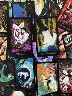 many different colored cards with images of women and trees on them, all showing the same woman's body