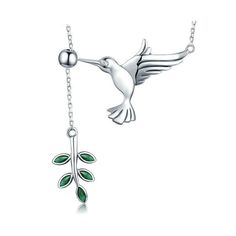 Material: 925 Sterling Silver, Cubic ZirconiaPendant Size: 3.1cm by 2.2cmChain Length: 38cm, 7cm extensionWeight: 4.1g per pairDesign: Bird with Tree Branch Dangle Drop EarringsColor: Green, White, SilverPart of Frias Earrings, Necklace and Ring Set Hummingbird Jewelry, Hummingbird Necklace, Hummingbird Pendant, Dangle Necklaces, Bird Pendant, Sterling Silver Necklace Pendants, Silver Spring, Leaf Necklace, Leaf Pendant