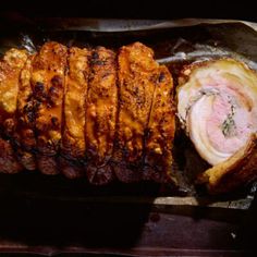 meat wrapped in foil on top of a table