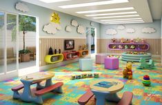 the children's playroom is brightly colored and has toys on the floor in it