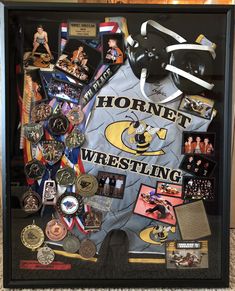 a display case filled with lots of different sports memorabilia