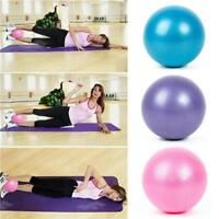 the woman is doing exercises on her yoga mat with three balls in front of her