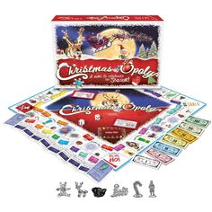 the christmas open board game is shown with its contents and pieces in front of it