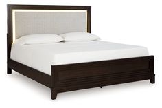 a bed with white sheets and pillows on top of it's headboard, against a white background