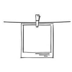 a black and white drawing of a square object hanging from a wire on a wall