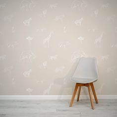 Safari Sketchbook Wallpaper In Room WIth Grey Chair Beige Nursery Wallpaper, Sketched Animals, Whimsical Sketches, Seaside Wallpaper, Sketchbook Wallpaper, Beige Nursery, Beige Backdrop, Marble Wall Mural, Tropical Art Deco