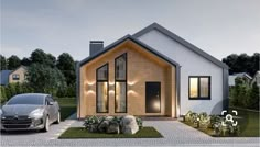 two cars parked in front of a house with lights on the windows and doors,