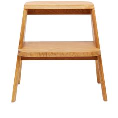 a small wooden step stool on white background