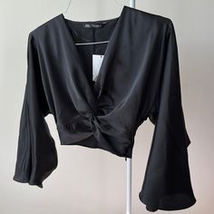 This Blouse Is Black, Beautiful And Soft Material. Size Xs Chic Black V-neck Crop Top, Trendy V-neck Crop Top For Evening, Zara V-neck Blouse For Date Night, Elegant V-neck Crop Top For Day Out, Zara Black V-neck Top, Elegant Zara Crop Top For Day Out, Chic Zara Crop Top For Evening, Black V-neck Crop Top For Day Out, Elegant Black Top For Going Out