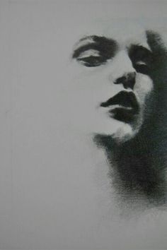 a black and white drawing of a woman's face