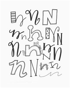 the alphabet is drawn in black and white