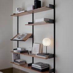 a book shelf with books and other items on it